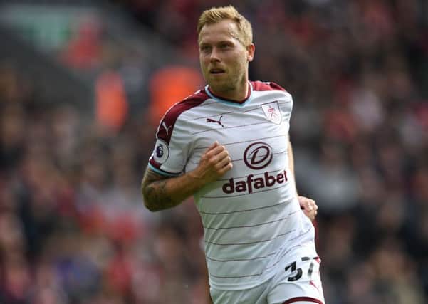 Scott Arfield celebrates after scoring against Liverpool in September 2017. Picture: AFP/Getty Images