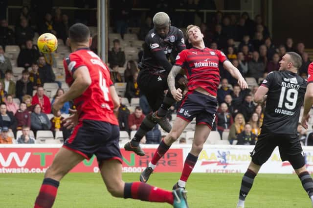 Motherwell's Cedric Kipre scores his team's second goal. Picture: SNS/Bill Murray