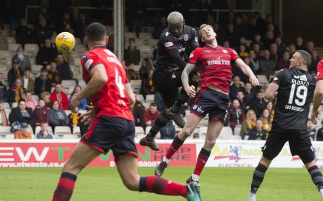 Motherwell's Cedric Kipre scores his team's second goal. Picture: SNS/Bill Murray