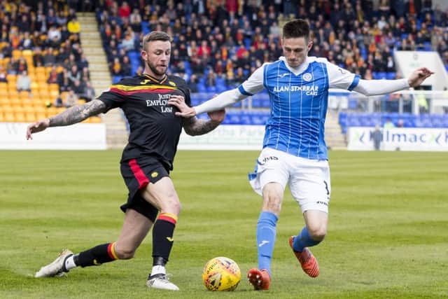 Partick Thistle's Christie Elliot in action with St Johnstone's Scott Tanser. Picture: SNS/Alan Rennie