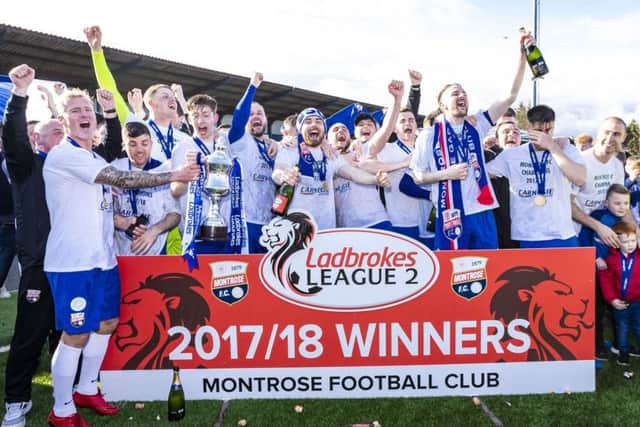 Montrose celebrate winning the Ladbrokes League Two title. SNS/Roddy Scott
