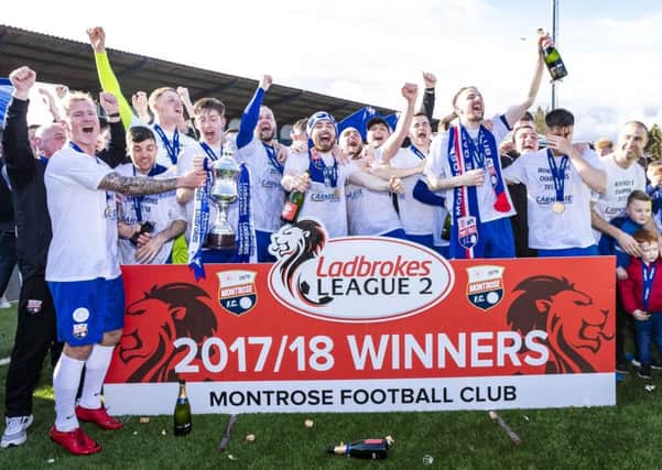 Montrose celebrate winning the Ladbrokes League Two title. SNS/Roddy Scott