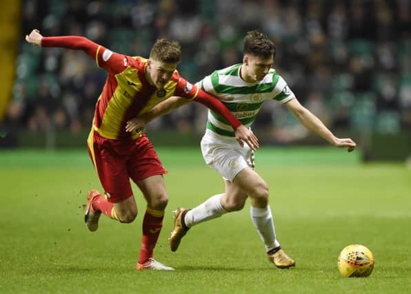 Celtic left-back Kieran Tierney, right, is wanted by several clubs in England. Picture: PA