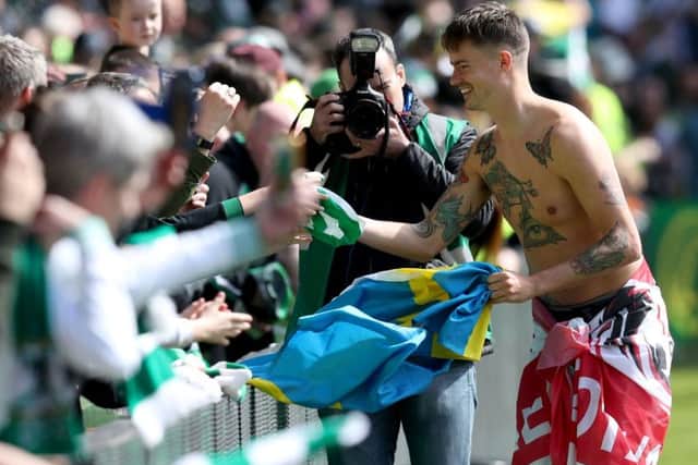Mikael Lustig meets with Celtic fans after helping the club to secure another title. Picture: PA