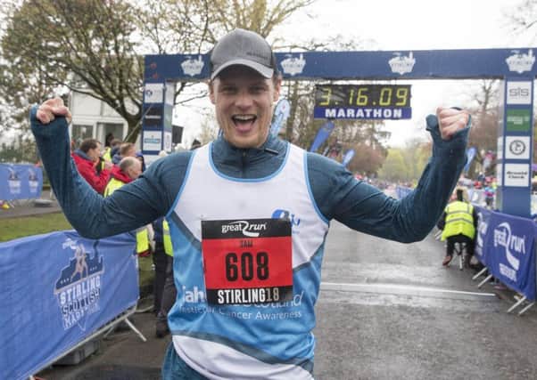 Outlander star Sam Heughan at the finish of the Stirling Scottish Marathon. Picture: PA Wire/Jeff Holmes