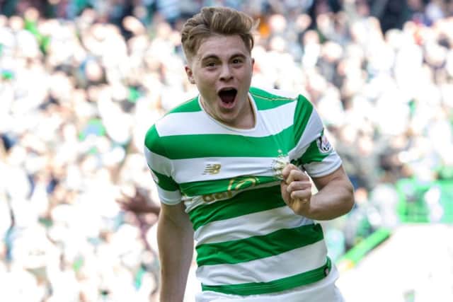 James Forrest celebrate as he gives Celtic a 3-0 lead over Rangers on Sunday.