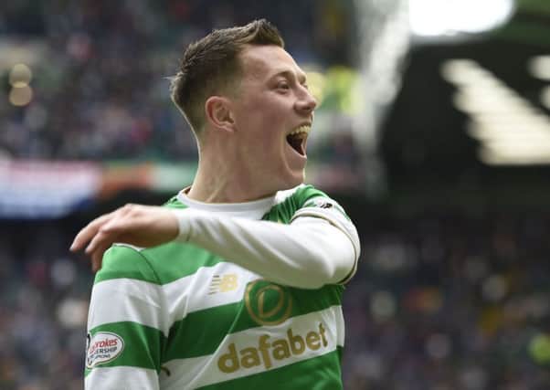 Callum McGregor celebrates after scoring the fifth Celtic goal  against Rangers.