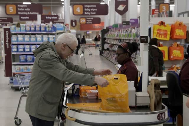 Sainsburys and Asda yesterday confirmed they are in advanced talks to combine their businesses. Picture: AP Photo/Matt Dunham