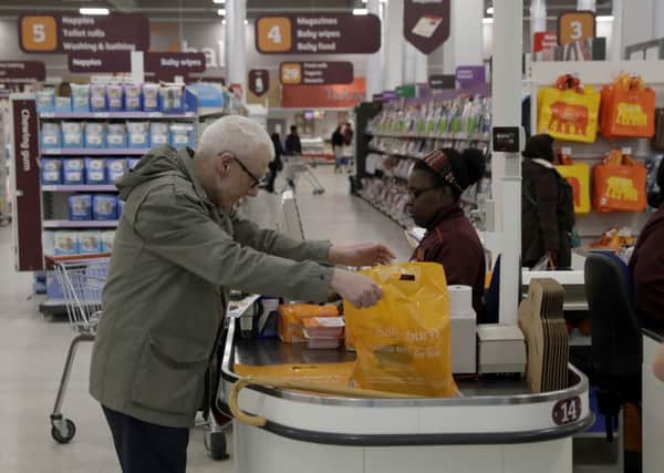 Sainsburys and Asda yesterday confirmed they are in advanced talks to combine their businesses. Picture: AP Photo/Matt Dunham