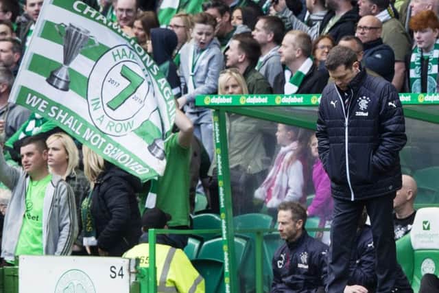 A crestfallen Graeme Murty 
on the touchline during Rangers
 
5-0 humiliation at Celtic.