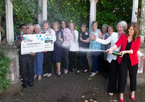 The Winning Nurses syndicate at Cleland Hospital, who won a Â£1 million lottery prize