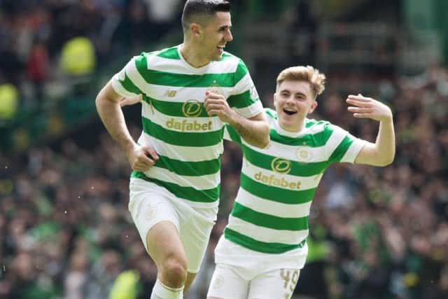 Tom Rogic celebrates his goal against Rangers with James Forrest. Picture: Paul Devlin/SNS