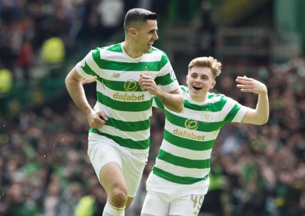Tom Rogic celebrates his goal against Rangers with James Forrest. Picture: Paul Devlin/SNS