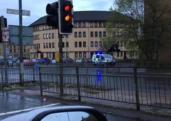 Police remain at the scene of the incident on Atlas Road. Picture: Bearsdenblunose/Twitter
