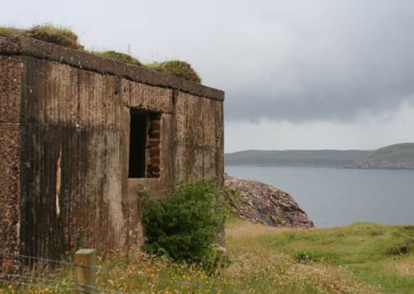 Crumbling Second World War fortifications remain by Loch Ewe.,