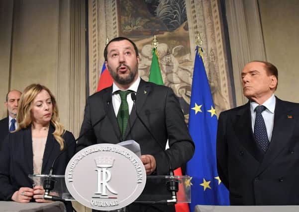 Giorgia Meloni, of the Brothers of Italy party, with Matteo Salvini (centre), of the far-right party Lega Nord andSilvio Berlusconi, of Forza Italia, have formed a coalition in Italy (Picture: AFP/Getty)