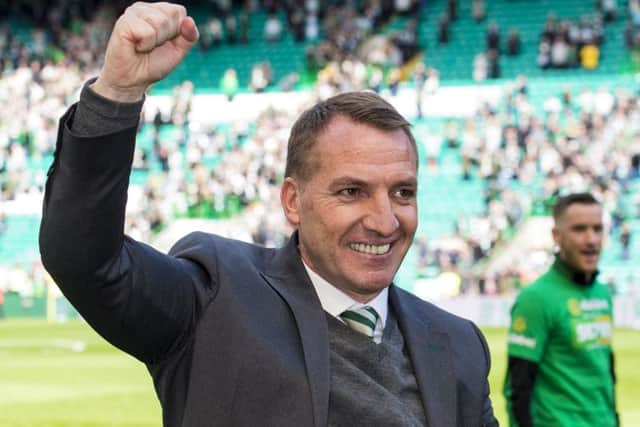 Brendan Rodgers  celebrates Celtic's 5-0 demolition of Old Firm rivals Rangers.