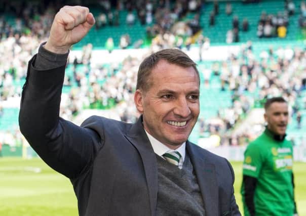 Brendan Rodgers  celebrates Celtic's 5-0 demolition of Old Firm rivals Rangers.