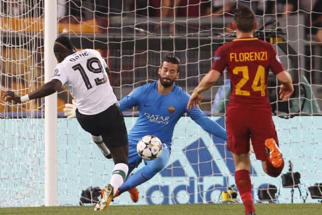 Sadio Mane gives Liverpool a ninth-minute lead in Rome.