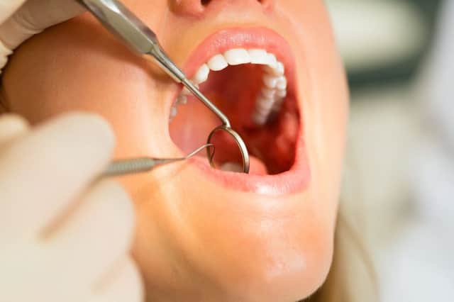 A leading Scottish oral surgeon wants dentists to use signs of facial pain as a reason to investigate potential domestic abuse