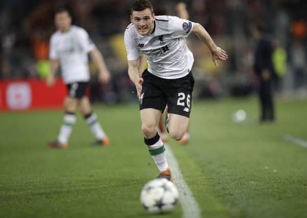 Andy Robertson hunts down the ball during the Champions League semi-final clash against Roma. Picture: AP