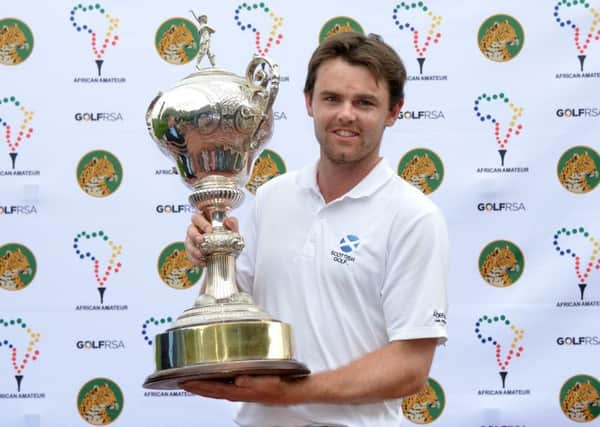 Liam Johnston with the Africa Amateur Championship trophy. Picture: Contributed