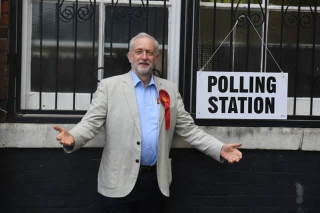 Jeremy Corbyn arrives to cast his vote at the polling station in Pakeman Primary School in Holloway, London, during the local council elections on Thursday. Picture: PA