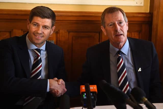Gerrard shakes hands with Rangers chairman Dave King as he is unveiled as the club's new manager. Picture: AFP/Getty Images