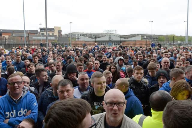 Fans gathered outside Ibrox ahead of Gerrard's unveiling as manager. Picture SNS Group
