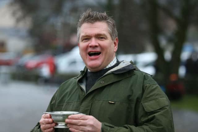 Ray Mears received Â£2,000 from Sterling for opening the fishing season. Picture: Andrew Milligan/PA