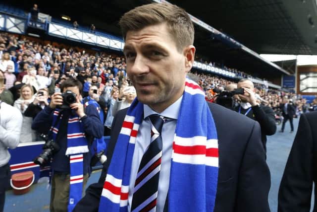 Steven Gerrard is greeted by the Ibrox faithful at his unveiling as Rangers manager. Picture: PA