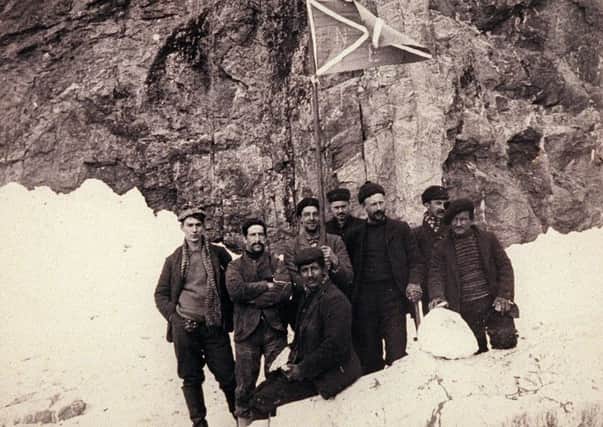 William Speirs Bruce with the crew of the Scotia, flying the expedition Saltire