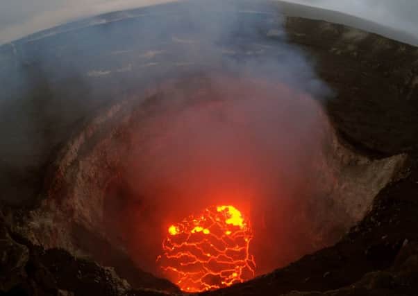 The governor of Hawaii has declared a local state of emergency near the Mount Kilauea volcano after it erupted following a 5.0-magnitude earthquake, forcing the evacuation of nearly 1,700 residents. (Photo by U.S. Geological Survey via Getty Images)