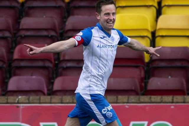 Veteran striker Steven MacLean celebrates completing his hat-trick. Picture: SNS Group
