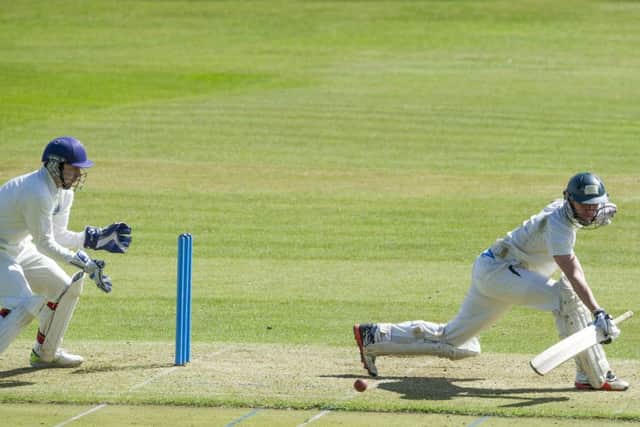Carlton batsman Rory McCann plays an unorthodox shot during his sides Edinburgh derby win over Watsonians at Grange Loan.  Photograph: Ian Rutherford.