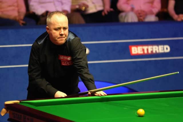 John Higgins spotted a fault in his game while watching himself on TV between sessions. Picture: Getty.