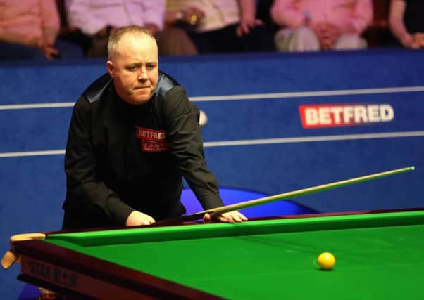 John Higgins spotted a fault in his game while watching himself on TV between sessions. Picture: Getty.