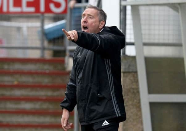 Peterhead manager Jim McInally described his team as 'thoroughly professional'. Picture: SNS.