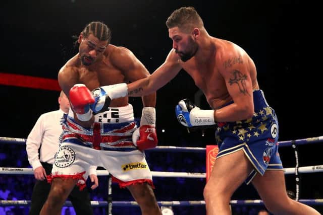 Tony Bellew (right) sent David Hayes to the canvas three times during their fight at the O2 Arena. Picture: PA