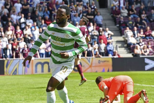 Moussa Dembele celebrates his goal after beating Jon McLaughlin from inside the penalty box. Picture: SNS