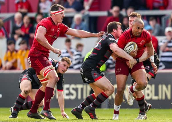 Simon Zebo is tackled by Edinburgh centre Mark Bennett, but the Irishman was to have a telling impact on the game. Picture: Rex/Shutterstock