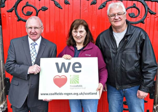 Bob Young, Scottish Trustee of the Coalfields Regeneration Trust with Lynda Maguire and Terry Harkins of Dalkeith Midlothian Kinship Carers