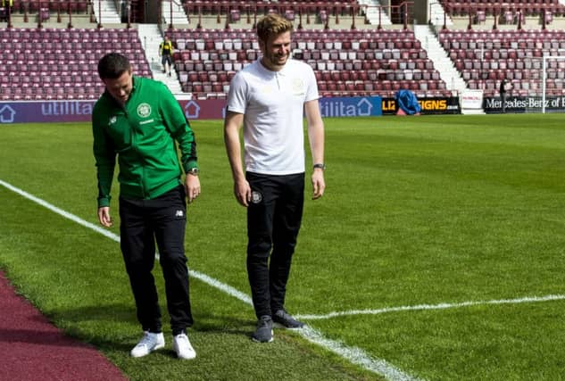 Stuart Armstrong and Callum McGregor inspect the Tynecastle pitch before kick-off. Picture: SNS