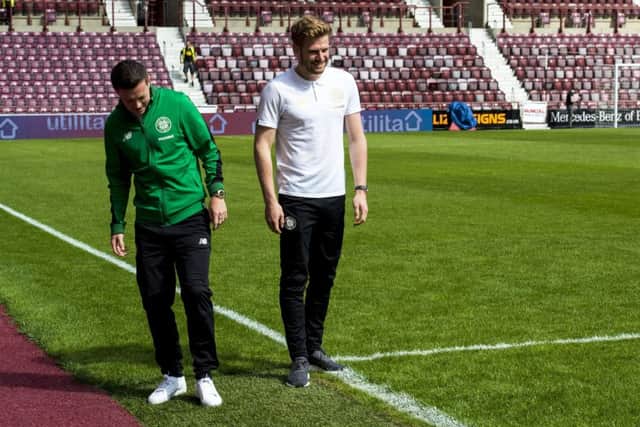 Stuart Armstrong and Callum McGregor inspect the Tynecastle pitch before kick-off. Picture: SNS