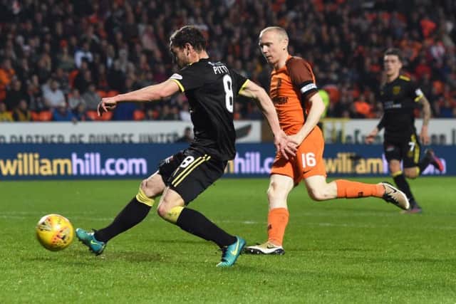 Scott Pittman scores to give Livingston a 3-2 victory at Tannadice  as David Hopkins team take the initiative in their play-off tie. Picture: SNS.