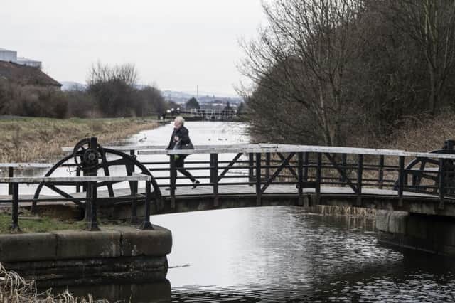 The lift bridge at Knightswood, Glasgow, is one of those in need of repair on the Forth and Clyde canal. The waterway, which was first opened in 1790, was restored in 2000. Picture: John Devlin