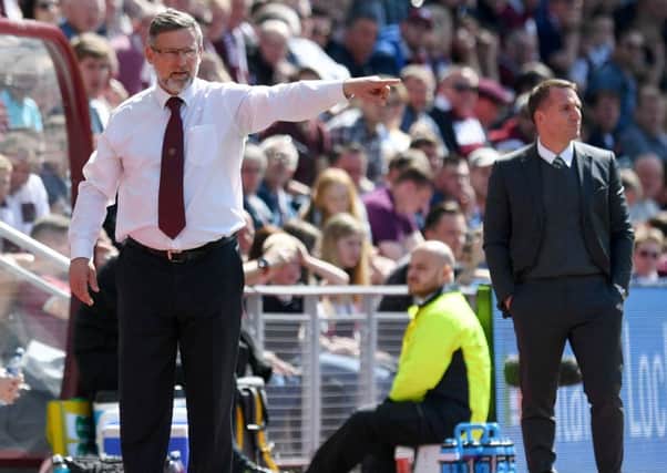 Hearts manager Craig Levein makes a point during Sundays clash at Tynecastle as Celtic boss Brendan Rodgers looks on. Picture: SNS.