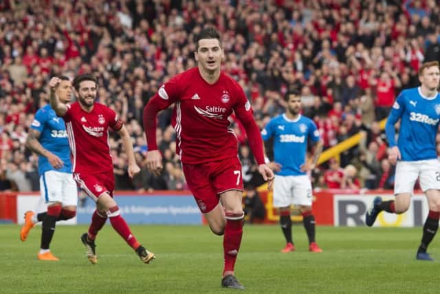 Kenny McLean celebrates opening the scoring for Aberdeen. Picture: SNS