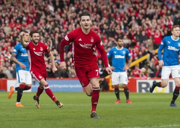 Kenny McLean celebrates opening the scoring for Aberdeen. Picture: SNS