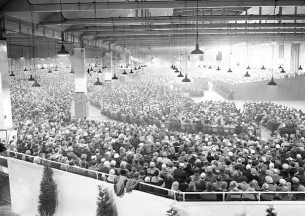 Billy Graham speaks to the multitudes at the Kelvin Hall.